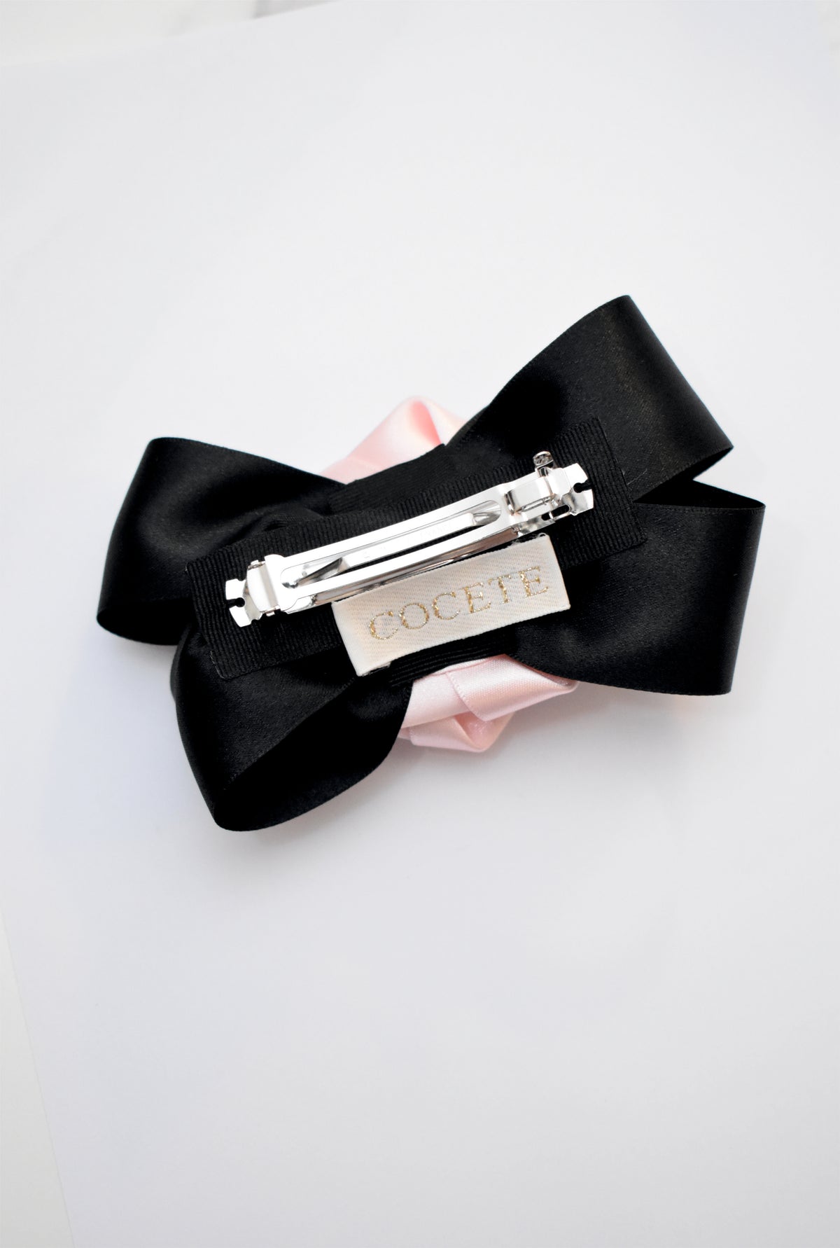 Coquette White Satin Rose Hair Clip with Black Statement Bow & Pearl Center