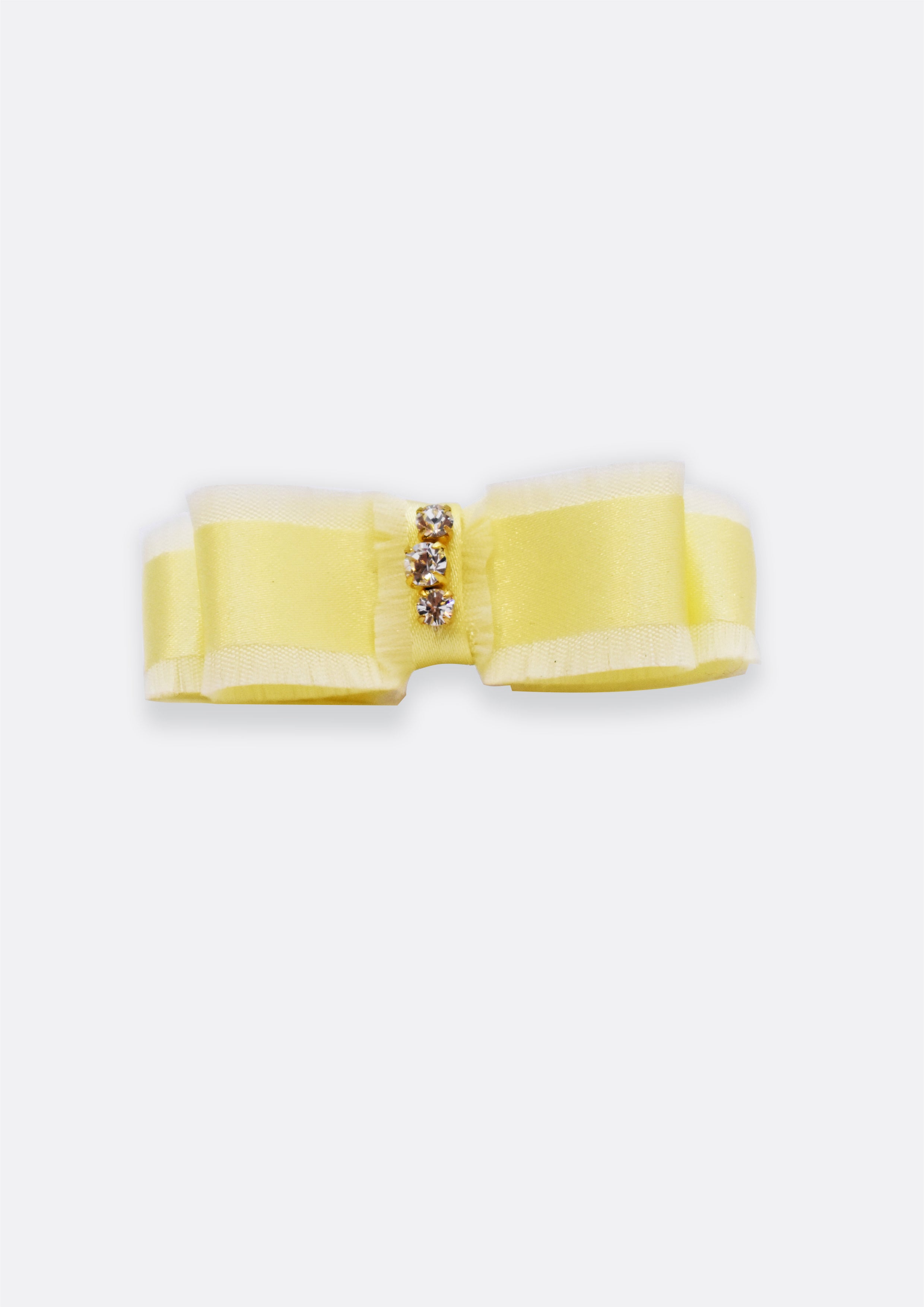 Handmade bright yellow ribbon hair bow clip for girls featuring three sparkling crystals in the center, isolated on a light background.