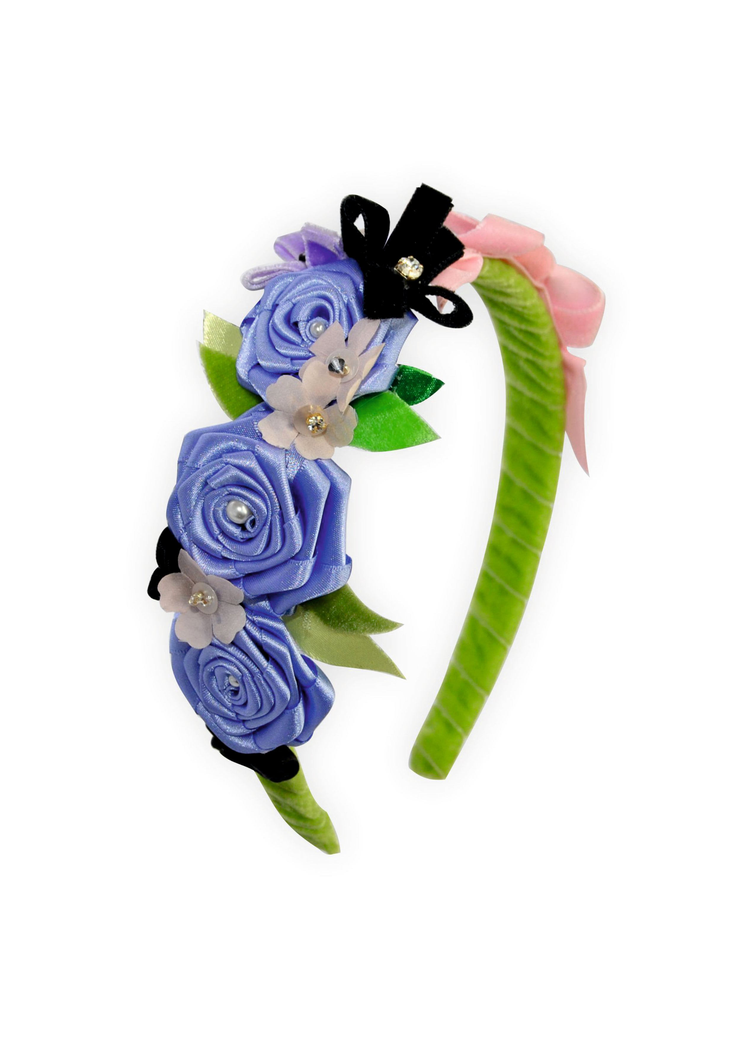 Handmade floral headband with purple satin roses, pink blossoms, sparkling crystal centers, and a black velvet bow on a green velvet band.