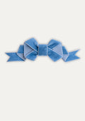 Blue bow on a white background
Handmade aqua blue velvet hair bow clip on a white background.
Little girl wearing a large aqua velvet bow hair clip in her blonde hair.
Close-up of soft velvet fabric and secure metal clip of the aqua hair bow.