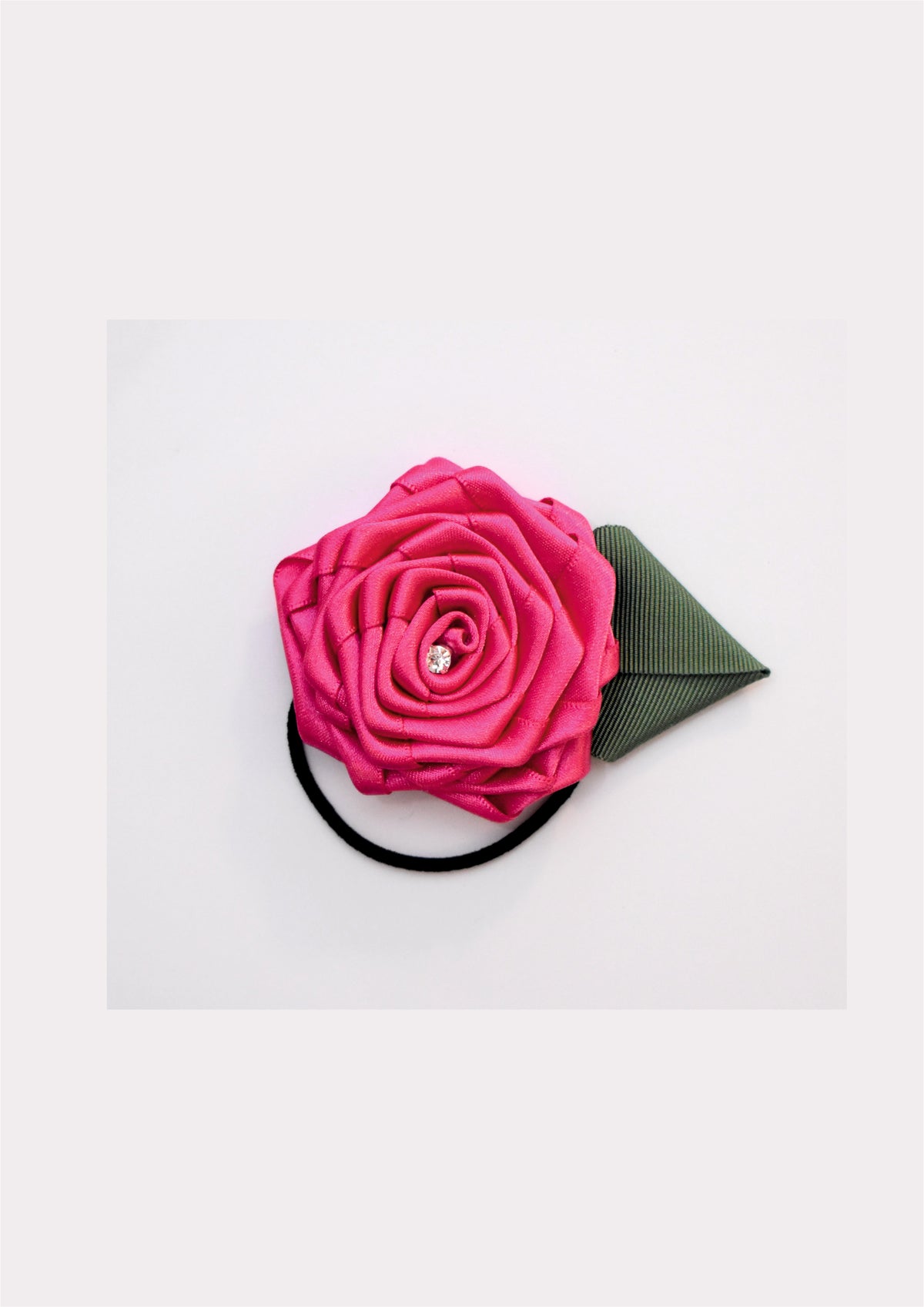 Pink rose hair tie for girls with green leaf and sparkling centre